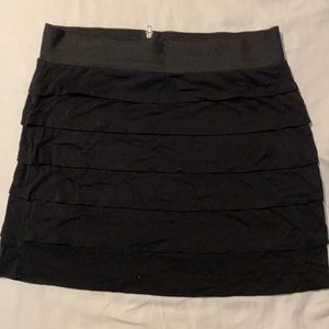 Ruffle black mini skirt